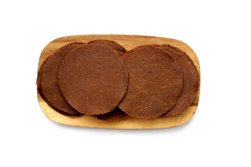 Fermented soybean discs, known as “Thua Nao,” a traditional Thai seasoning used to enhance flavor in Northern cuisine.