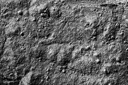 Monochromatic texture of a concrete wall with a rustic finish. Old cement wall