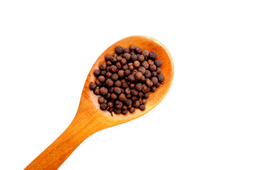 Brown dried allspice spice seeds.