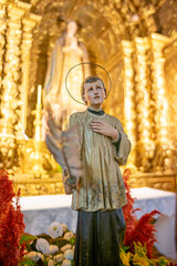 Statue of Saint Lawrence inside a Catholic church 