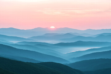 Obraz premium Majestic panorama of morning wild nature high in the mountains, with layers of rolling hills fading into the distance under a pastel-colored sky. The early morning mist lingers in the valleys, 