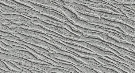 Gray decorative plaster with a rough wavy and grooved texture.