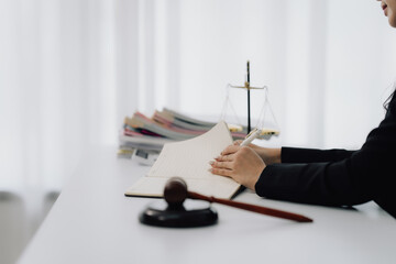 Lawyer Reviewing Legal Documents in Office