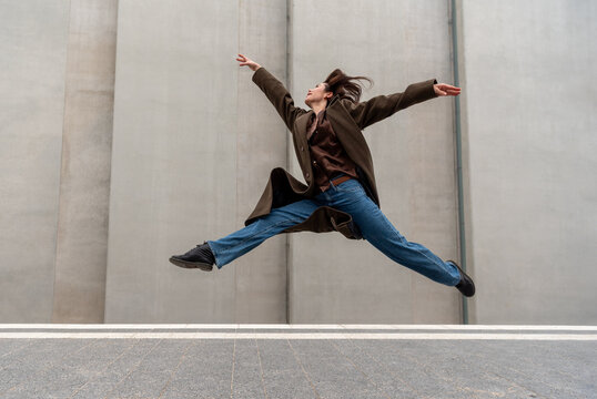 Ballerina jumping and dancing on the streets of Stuttgart city