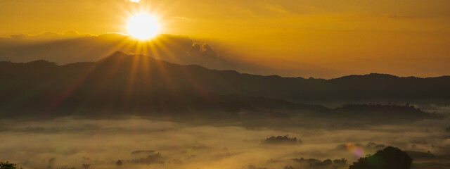 Banner Golden sky sunrise dramatic beautiful landscape view. Dawn sky gold dusk time cloudscape with sunlight. Panorama Dramatic sunset scenic landscape. Beautiful landscape nature with copy space