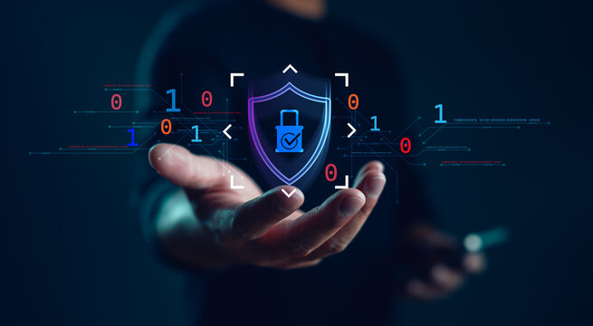 Cybersecurity concept with a digital padlock icon on shield in human hand, representing data protection, online security system, encryption technology and cyber defense. - Powered by Adobe