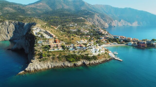 Coastal village with colorful houses and marina on Kefalonia island in Greece