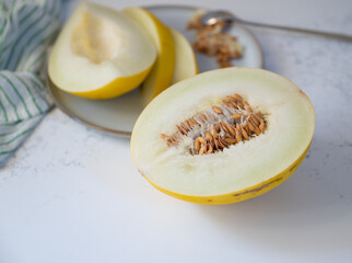 Canary and Snow Leopard Melon on Quartz Counter