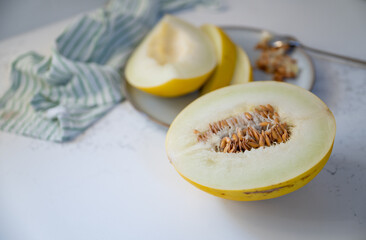 Canary and Snow Leopard Melon on Quartz Counter