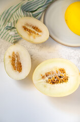 Canary and Snow Leopard Melon on Quartz Counter