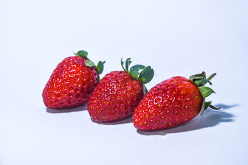 Isolated Fresh Strawberries on a Clean White Surface