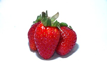 Strawberry with Green Leaves on White Background
