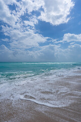 Ocean wave motion on sea shore. Summer sea breeze. Sea nature backdrop. Peaceful ocean. Dreamy ocean horizon. Coastal ocean paradise wallpaper. Seafoam waves.