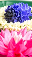 Floral arrangement of hyacinth, jasmine, and lotus