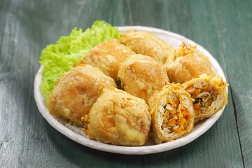 Tahu Isi. Stuffed tofu is known as fried food in the form of brown tofu filled with various fillings.