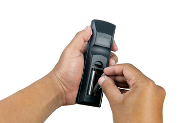 Selective focus on man hand holding tv remote control and changing battery isolated on white background. Replacement, spare parts of device. Watching television at home