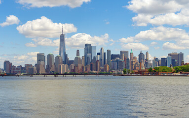 Fototapeta na wymiar NYC skyline with skyscrapers. Manhattan and Brooklyn. New York City skyline with Hudson River views. Downtown NYC. New York from waterfront skyline. Panorama of of New York.