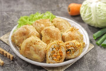 Tahu Isi. Stuffed tofu is known as fried food in the form of brown tofu filled with various fillings.