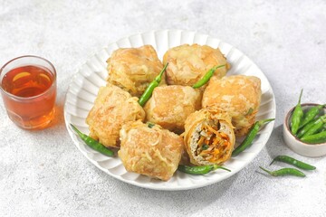Tahu Isi. Stuffed tofu is known as fried food in the form of brown tofu filled with various fillings.