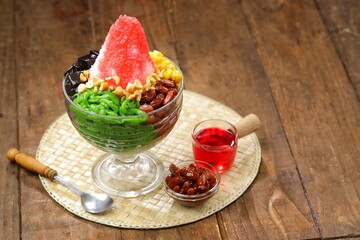 Ais kacang is a dessert that is quite popular in Malaysia and Singapore which contains cendol, red...