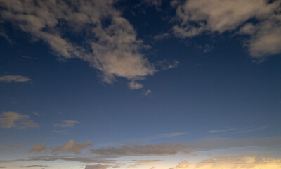 Sunrise Clouds background. Dramatic Clouds Sunset Background. Sky with clouds in Sunrise. Sunrise with clouds in various shapes background. Calm Cloud.