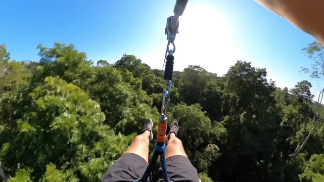 A thrilling first-person view of ziplining at high speed over a lush jungle canopy, a concept for adventure tourism and exhilaration.