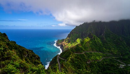 A sweeping vista of lush green mountains cascading down to a turquoise ocean, dotted with winding roads, reveals a dramatic landscape.