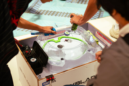 A weekly competition of Beyblade X, a battling spinning top, takes place at a shopping mall in Bangkok, Thailand, on August 16, 2025.