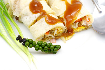 Thai Fresh Spring roll Snack with sweet sauce isolated on white background.