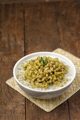 Bubur Kacang Hijau. Mung bean porridge, or often shortened to burjo, is an Indonesian sweet porridge made from green beans, coconut milk, and palm sugar or cane sugar.