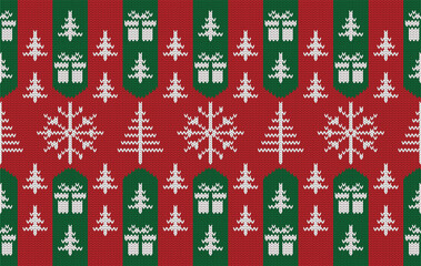 Knitted pattern seamless fabric Christmas tree. traditional knitted pattern Christmas snowflake and gift. Designed for knitted pattern ,fabric ,background ,wallpaper ,clothing ,embroidery ,textile