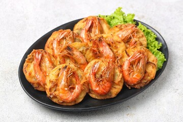 Bakwan Udang, ote-ote containing shrimp and vegetables is fried crispy with whole shrimp topping....