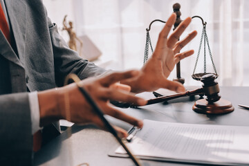 Lawyer explained to the client about the law that must be brought against the court case.