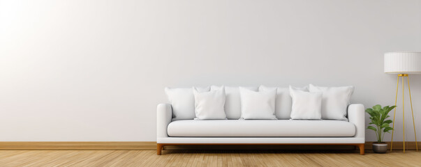  modern, minimalist living room featuring a white sofa with cushions, a lamp, and a plant, set against a light-colored wall and wooden flooring.