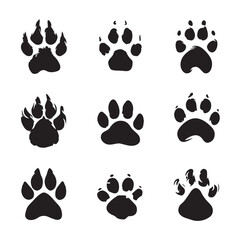 Fototapeta premium Vector illustration of dog paw silhouette set, Black & White silhouette set