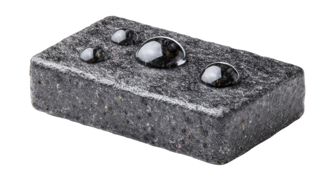 Dark gray rectangular block with water droplets