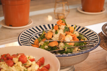 Colorful salad bowl with fresh vegetables on display