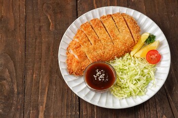 Ayam Teriyaki. Teriyaki chicken katsu is a Japanese dish consisting of pieces of chicken cooked in a sweet and savory teriyaki sauce. Teriyaki sauce is made from soy sauce, sugar, and spices.