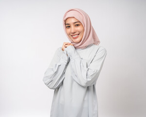 Portrait happy young asian muslim woman standing on isolated white background. Beautiful Attractive Muslim woman wearing abaya and hijab fashion costume shot in studio