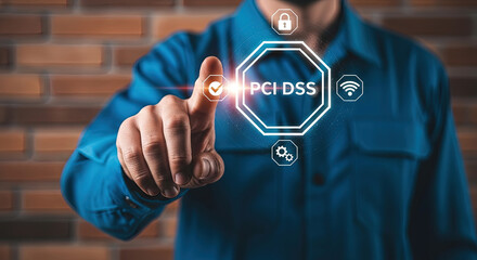 Hand touches PCI DSS icon representing secure online payment system compliance on brick background