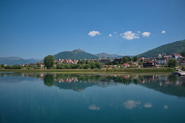 Obraz premium Panoramic view of Plav in Montenegro reflecting in Plav lake