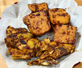Grilled Chicken and Grilled Tofu with Soy Sauce Seasoning Served as Indonesian Inspired Cuisine