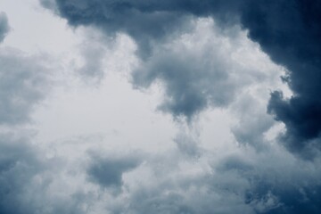 Playful Summer Clouds in Clear Sky
