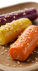 Photo Of Cooked Carrots With Sesame Seeds On Wooden Plate Closeup