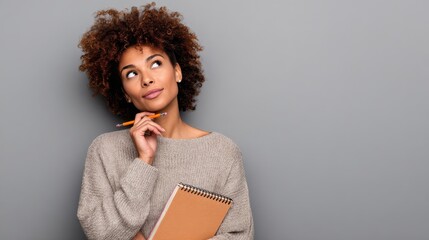 education school and people concept  african american woman with notebook and pencil over grey background no logos no brands ar 169
