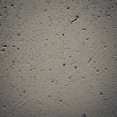 Plain light gray concrete surface texture with embedded small stones. Uniformly textured surface with subtle variation in tone.