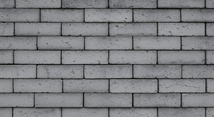 Close-up: gray brick wall texture. Uniform rectangular blocks, subtle tone variations. For ads/editorial: construction, architecture, design.