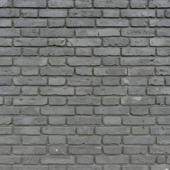Obraz premium Grey brick wall exterior showing uniform pattern. A detailed, textured surface suitable for architecture and design projects. Building exterior.