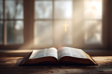 An open Bible placed on a wooden table with soft natural light with a cross shaped light, symbolizing prayer, faith, and devotion