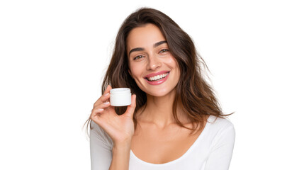 Fototapeta premium A joyful woman holding a small cream jar, smiling brightly against a white background.